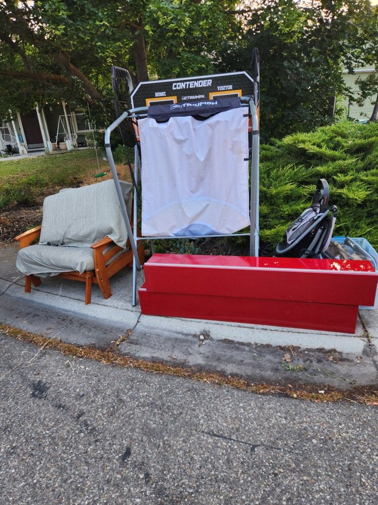 Free Stuff! Indoor basketball double hoop, two lrg Red locker cabinets, luv seat futon, 3 wheel stroller, tub with easter stuff!