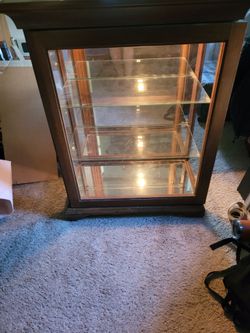 Wooden curio cabinet
