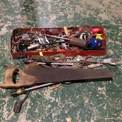 Red Tool Box Filled With Screwdrivers, Saw, Sockets, And Other Random Tools