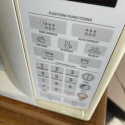 GE microwave works great with microwave stand 35 each or 50 for both