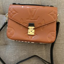 lot of purses and handbags