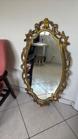 vintage miror with cable to hang