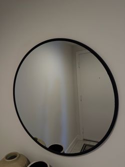 Black round mirror