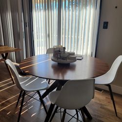 Round Table In Walnut And Four Chairs
