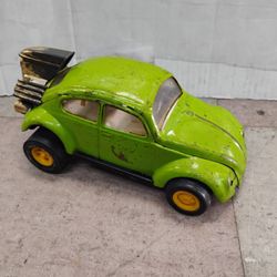 Vintage Tonka Volkswagen Super Beetle toy car, also known as a "Side Winder" model.