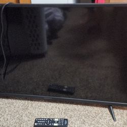 40 Inch Insignia TV With Remote And Roku Box.