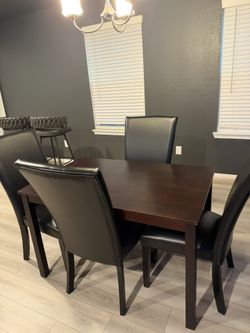 Dining Room Table And Four Chairs