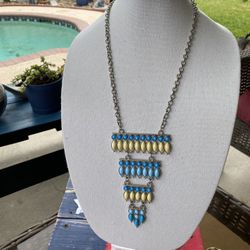 Tribal like faux stone slim line ladder necklace.