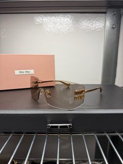 Miu Miu Rimless Sunglasses with Gold Hardware