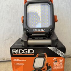 NEW Rigid Light w/battery & Charger!