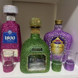 Empty blinged out bottles with matching shot glass