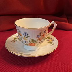 Gold rimmed footed teacup with matching saucer Aynsley Cottage Garden
