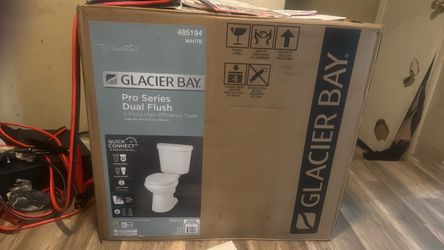 Toilet all white new.       W x 27.5 in D x 33.5 In H