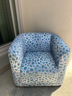 Blue floral swivel chair