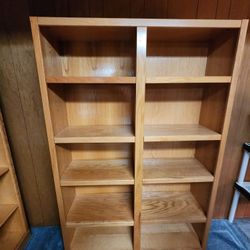 Wood double wide Bookshelf 
Bookcase has 8 adjustable shelves 
48"w x 12 5"d x 72 25"h