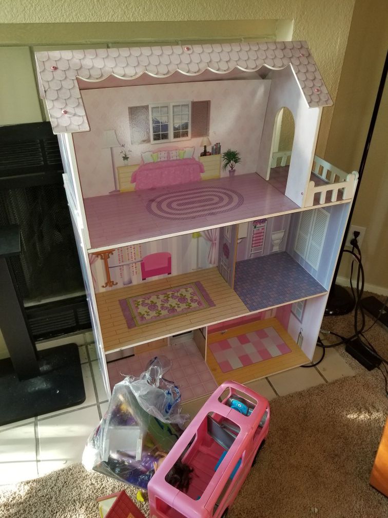 Large barbie doll house and camper