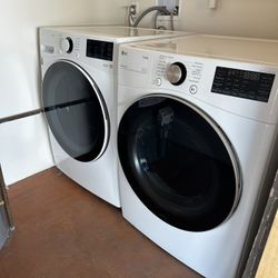 LG 4.5 CU. FT. Front Load Washer And 7.4 CU. FT. Electric Dryer