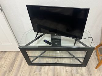 Onn Roku TV with Glass TV Stand