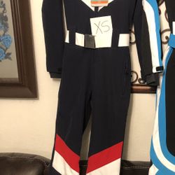 WOMEN’S NAVY   SLIM FITS WATERPROOF  SKI  SUIT. AND SPYDER SKI BIB. ASKING 100 EACH 