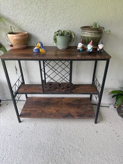 Rustic Brown & Black Bar Table – $30