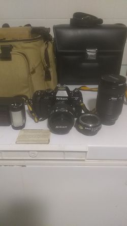 NIKON N2020 AND ACCESSORIES ONLY USED A COUPLE TIMES
