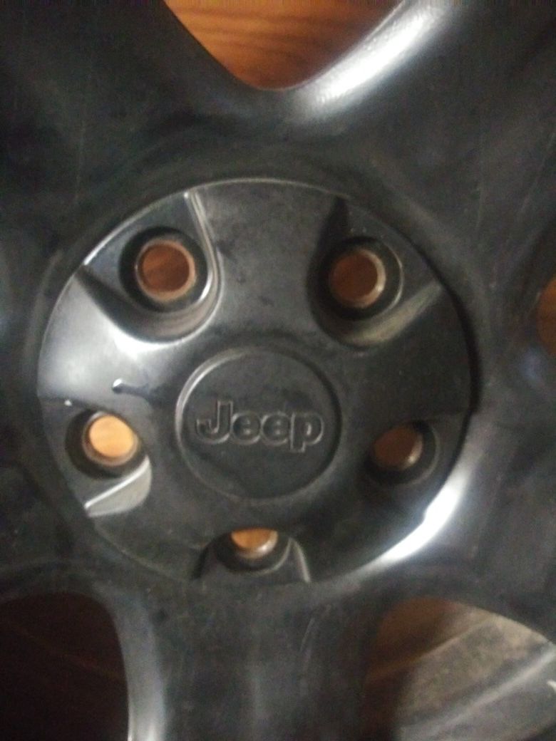 15 inch jeep wheels with tires like new