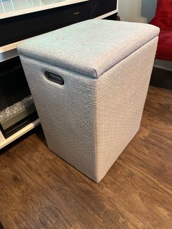 Fabric storage pouf for the living room