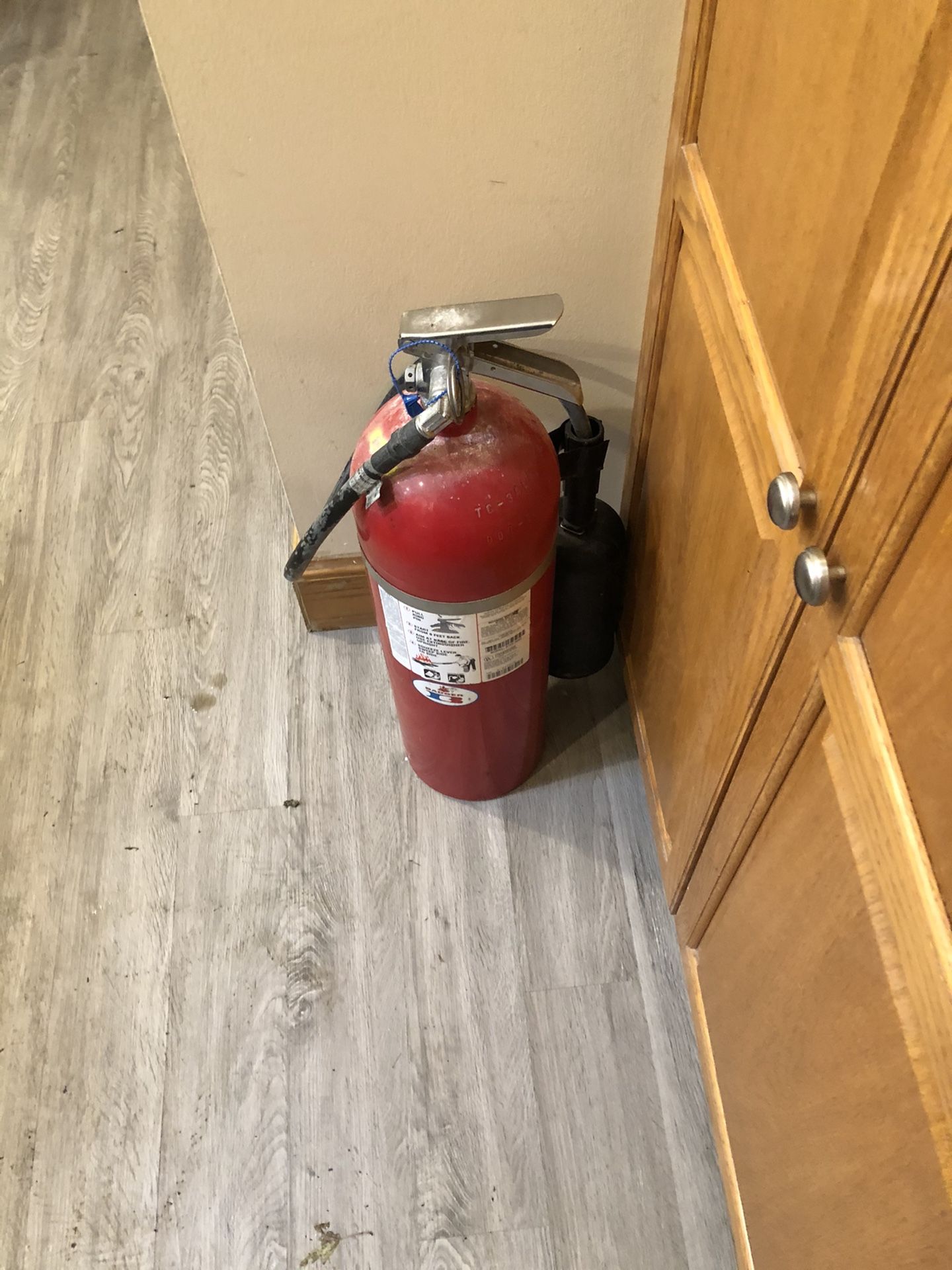 Large fire extinguisher very heavy - charged but expired