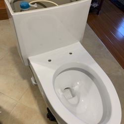 Large One Piece Elongated Toilet. Complete & Brand New!