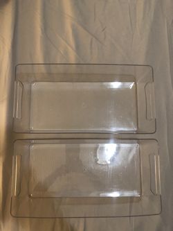 Durable clear plastic trays with handles.Size 6x12 inches