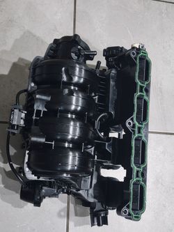 Hyundai/Kia Kefico engine intake manifold runner vacuum actuator, model number 28323-2GGA1.