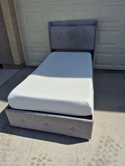 Twin Size platform bed frame with mattress and 3 storage drawers,  gray color. In Very Good Condition