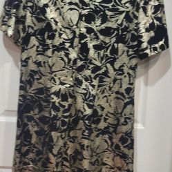 Shelby & Palmer, which specializes in women's clothing, including dresses, as indicated by the visual matches of the brand's label. The specific item 