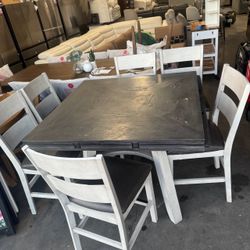 Counter-height extendable dining table with 6 https://offerup.com/redirect/?o=Y2hhaXJzLmlu Good condition with some cosmetic wear as shown. Located in