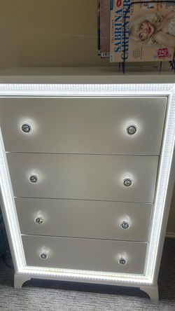 Alyssa White dresser with lights from Rooms to Go