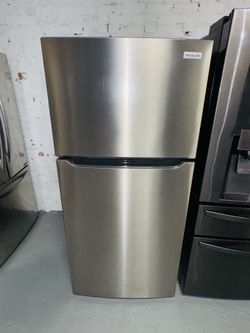 Frigidaire stainless steel refrigerator (30" x 66" x 29") — includes a receipt for a 90-day warranty.