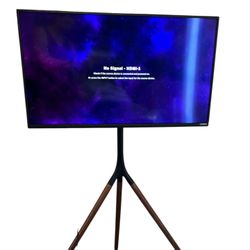 Vizio flat screen tv with tripod style stand