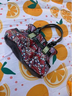 kathy van zeeland hand bag