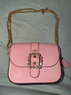 Barely used pink coach purse