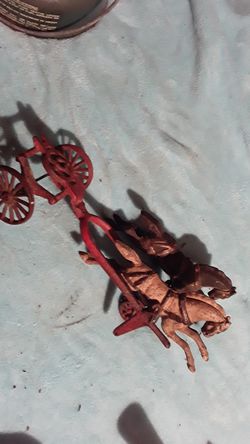 Antique cast iron fireman's kids toy