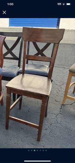 Solid wood, high bar chair. Check out my other posted items 