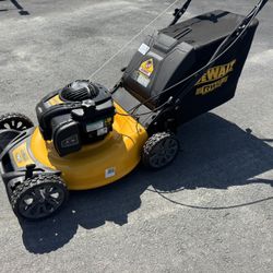 Like  New Dewalt Gas Mower 150cc RWD With 21” Cutting Deck And Bag. Must Pickup