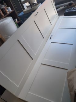 White Ikea Pax wardrobe doors with hinges and pulls