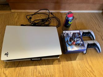PS5 (Disc Version) + 8 Games + 2 Controllers + Contact Cleaner for Stick Drift