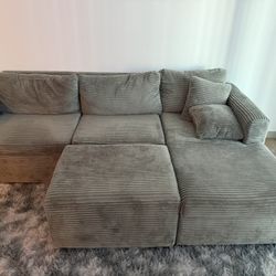 Couch With ottoman and rug