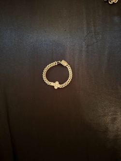 Shop Gld cross bracelet