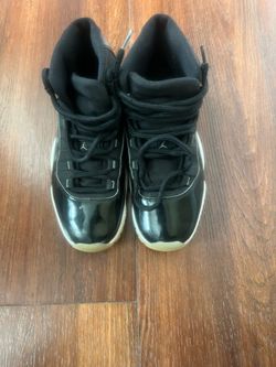 Air Jordan 11 Retro Black High-Top Sneakers