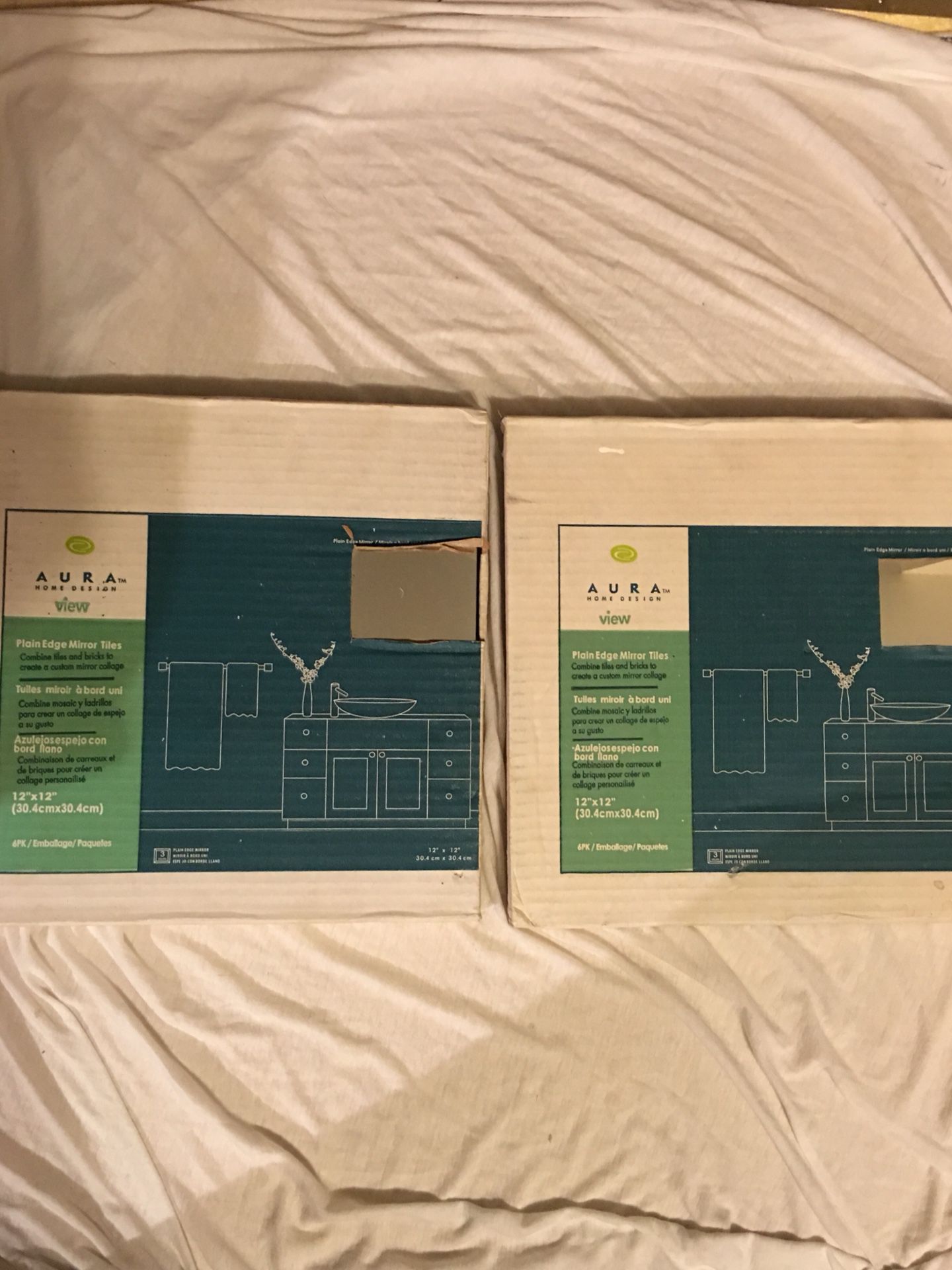 2 unopened boxes mirror tiles