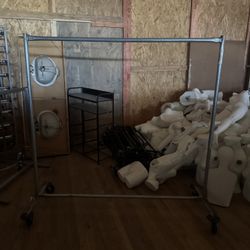 Rolling clothing garment rack