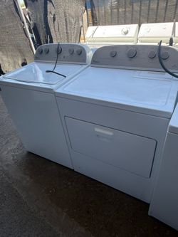 Whirlpool top load washer and electric dryer set